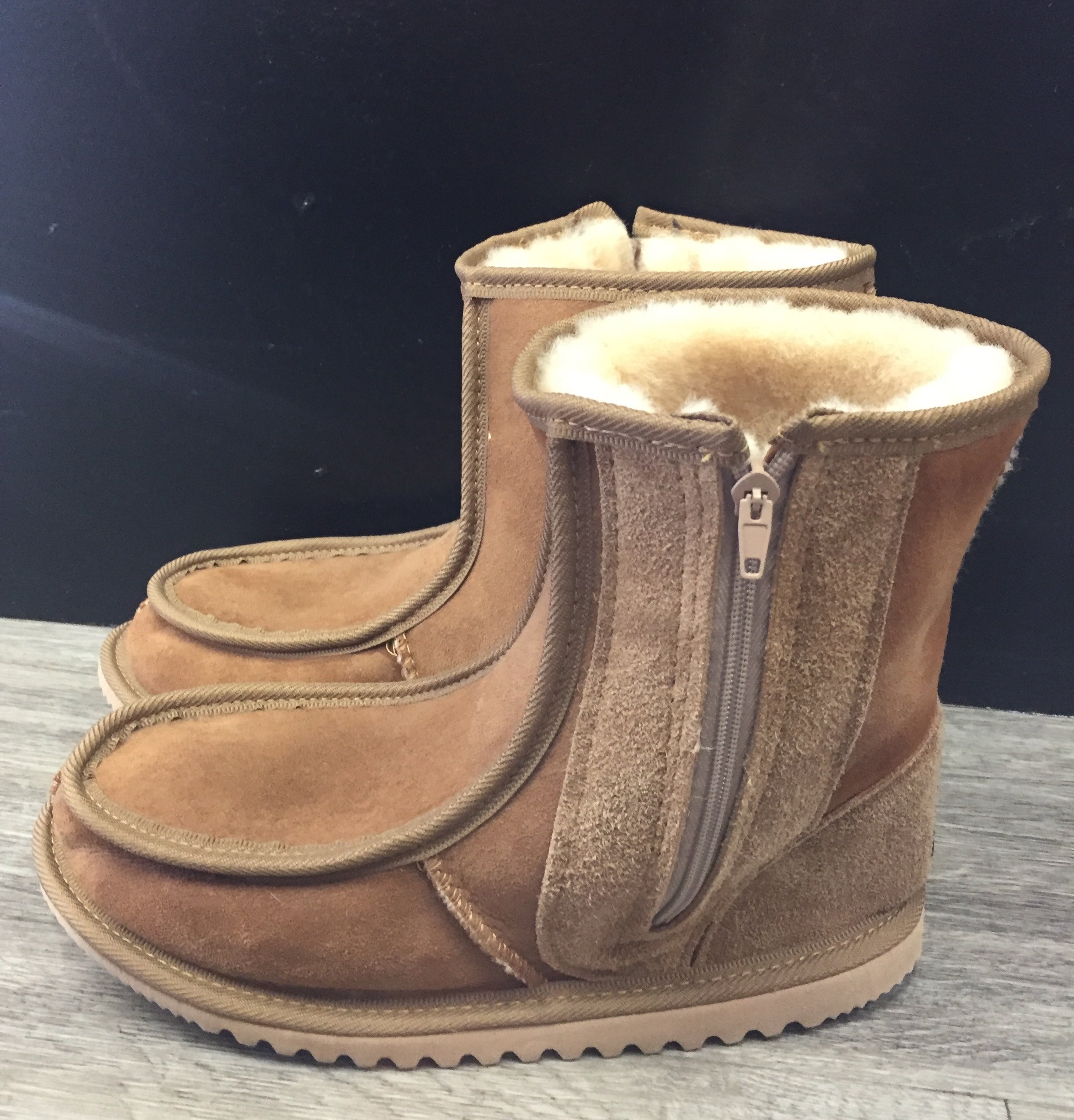 Dalvin zip boot deals with genuine shearling